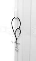 Medical stethoscope hanging on the door