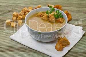 Chanterelle soup puree served with croutons