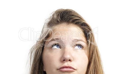 Close-up portrait of a beautiful teenager. Looking up into the c