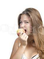 Portrait of an attractive young woman with an apple against whit