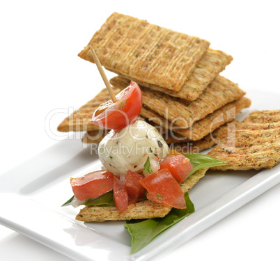 Crackers With Mozzarella And Tomatoes