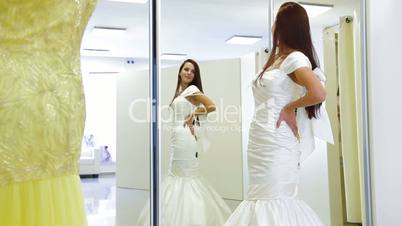 Bride Trying On Bridal Gown