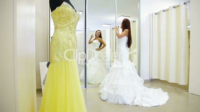 Trying On Wedding Dress in Bridal Boutique