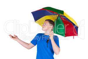 Man holding a rainbow coloured umbrella