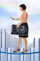 Business woman on tightrope
