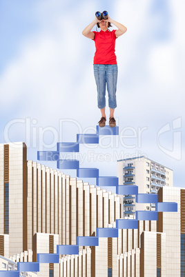 Woman on stairs looking over the roofs