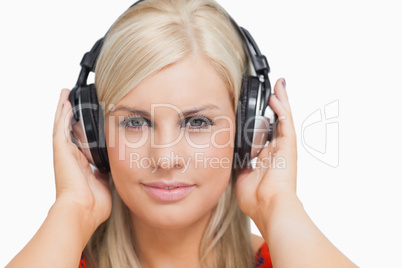 Blonde listening to music