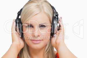 Blonde listening to music