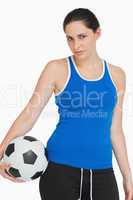 Sportswoman with a soccer ball
