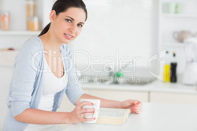 Brunette reading a book