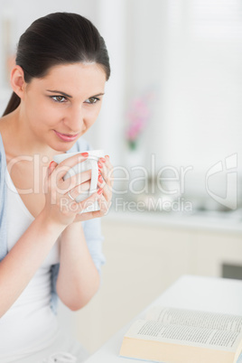 Brunette holding a mug