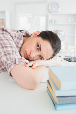 Woman resting on table