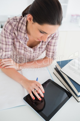 High view of a woman using a tablet computer