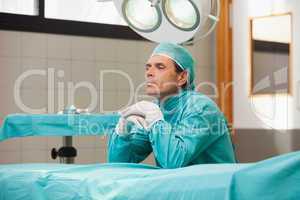 Surgeon sitting in a operating room