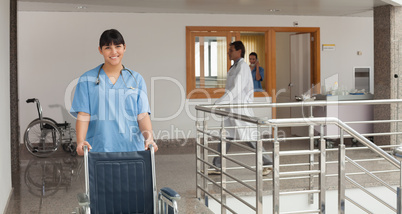 Doctors assistant pushing a wheelchair