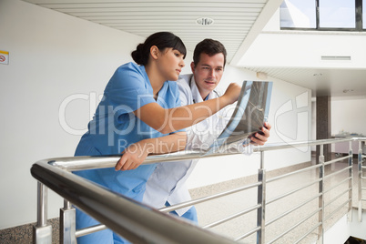 Nurse asking the doctor about  x-ray