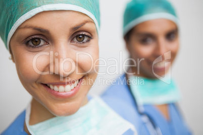 Smilling nurse in surgical cap