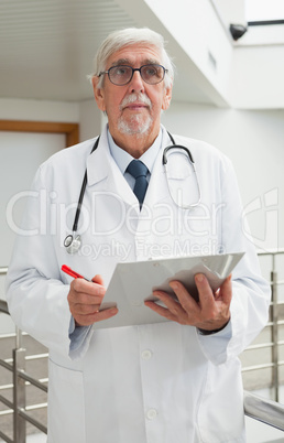 Doctor holding file