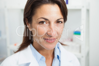 Smiling doctor in chemist