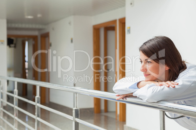 Woman leaning on the railing