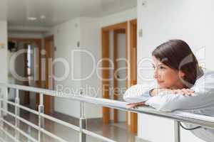 Woman leaning on the railing