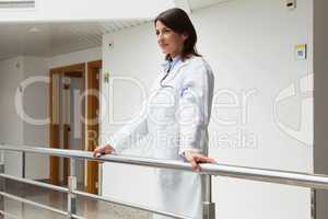 Doctor is standing at the railing