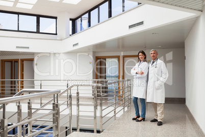 Two doctors standing in the corridor