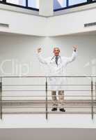 Doctor cheering at railing