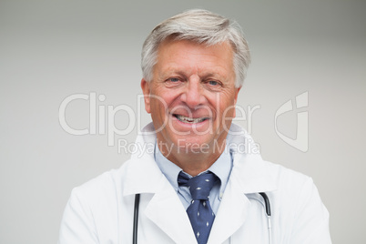 Mature doctor smiling