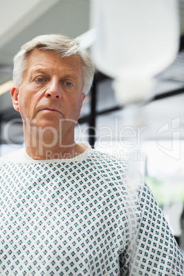 Sad patient with IV drip