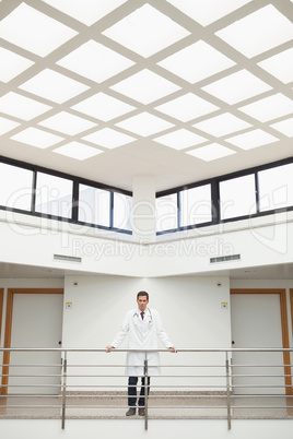 Doctor standing in stairwell