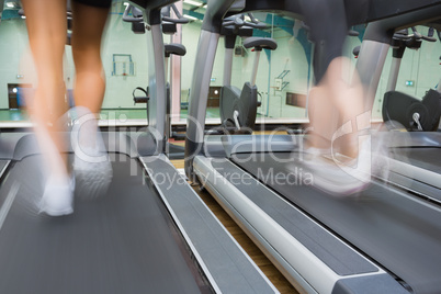 Running on a treadmill in the gym