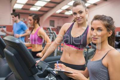 Smiling women in gym