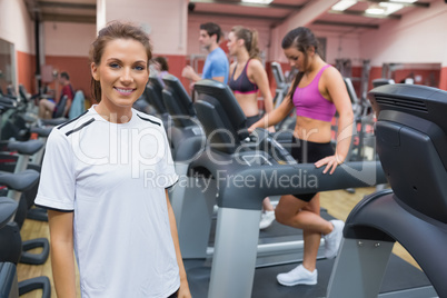 Woman smiling in the gym