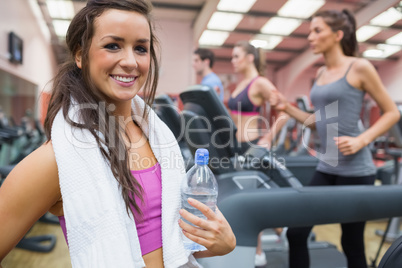 Woman happy in the gym after exercise