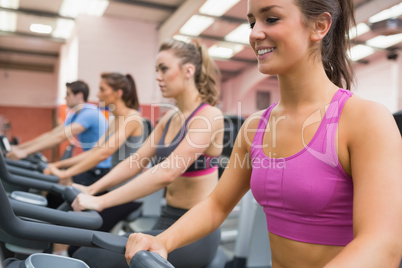 People on exercise bicycles