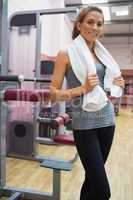 Smiling woman in a fitness studio