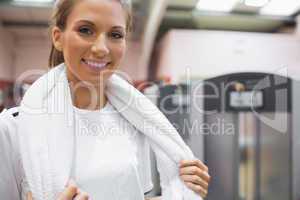 Smiling woman holding a towel