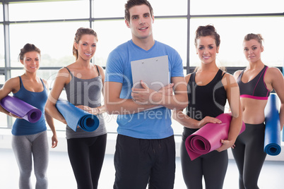 Trainer with his yoga class