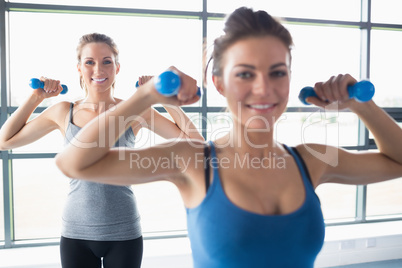 Women lifting weights