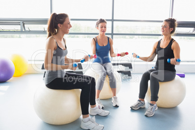 Women doing work out on exercise balls