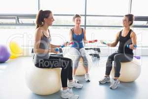 Women doing work out on exercise balls