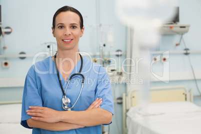 Smiling nurse in hospital ward