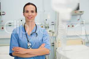 Smiling nurse in hospital ward