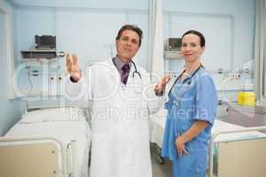Happy doctor and nurse
