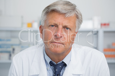Serious doctor in pharmacy