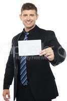Business consultant presenting blank placard