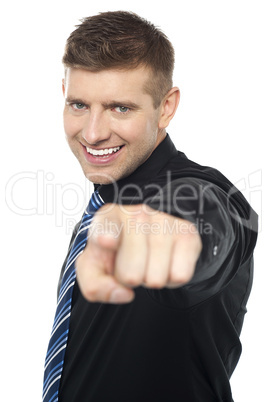Joyous business consultant pointing at you