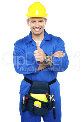 Young industrial contractor showing thumbs up