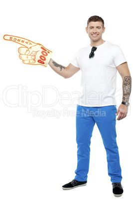 Sports fan holding Boo Hurray foam hand